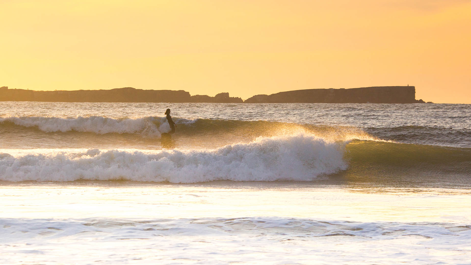 baleal sunset surfer